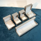 Golden PU textured leather jewelry box, fashionable accessory packaging box, ring box, pearl stud earrings box.