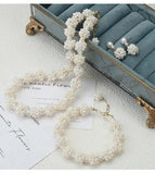 Baroque flower-shaped pearl necklace set.Bold Nature. Unapologetic Style. TWINKLE QUEEN