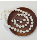Baroque flower-shaped pearl necklace set.Bold Nature. Unapologetic Style. TWINKLE QUEEN