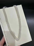 V-neck crocheted necklace that exudes elegance. Natural freshwater AK pearl necklace.